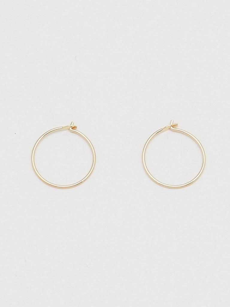 Close view flay lay of 14K 303 Mini Hoops Earrings Bagatiba