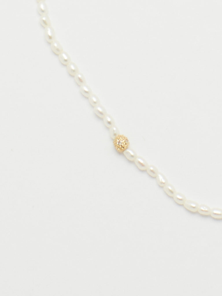 Close up flat lay 14K Diamond Pearl Necklace Necklace bagatiba