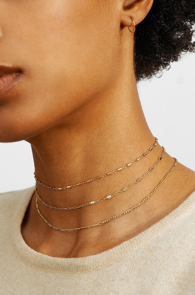 Model wearing 3 chokers including 313 Choker Choker Bagatiba