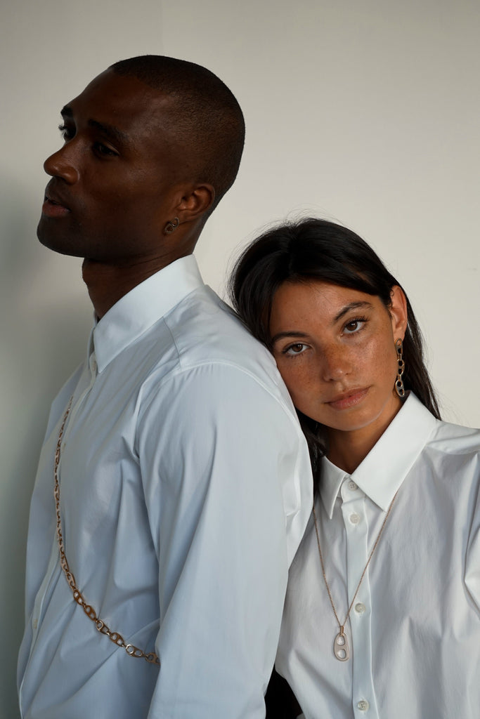 Two models in view with one wearing Adjustable Gold Tab Necklace Necklace bagatiba