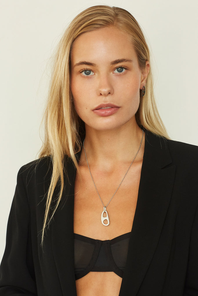 Model wearing Adjustable Silver Tab Necklace and Silver tab studs  bagatiba