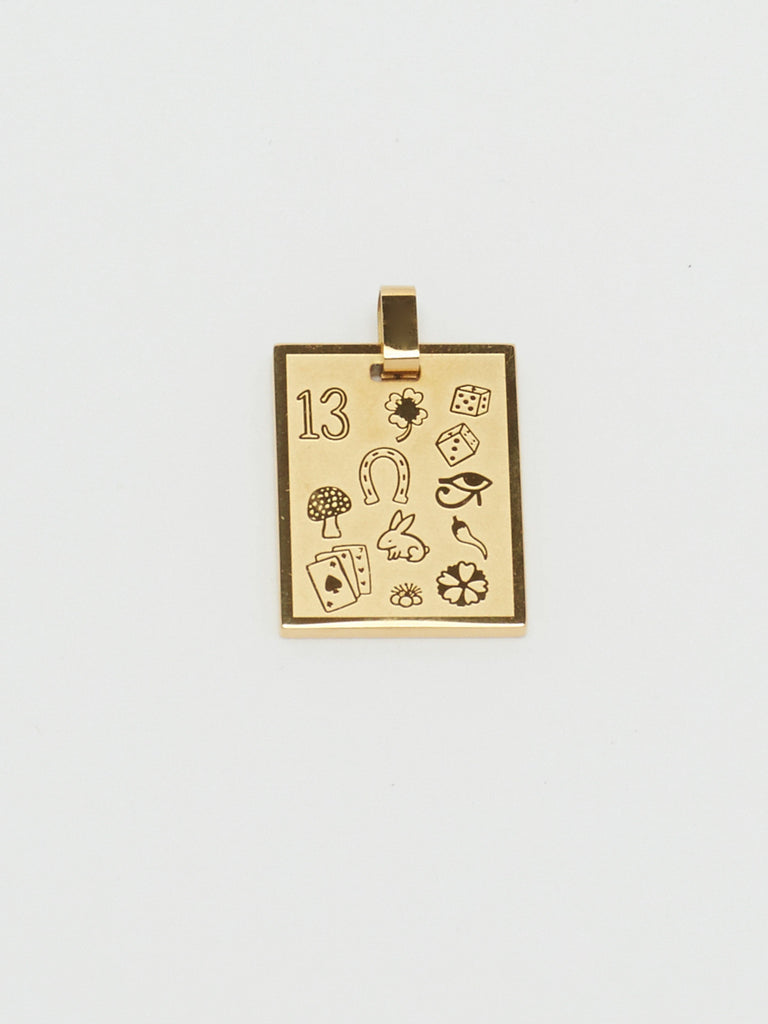 Detail view flat lay of Bagatiba Lucky Charm Necklace charm Bagatiba
