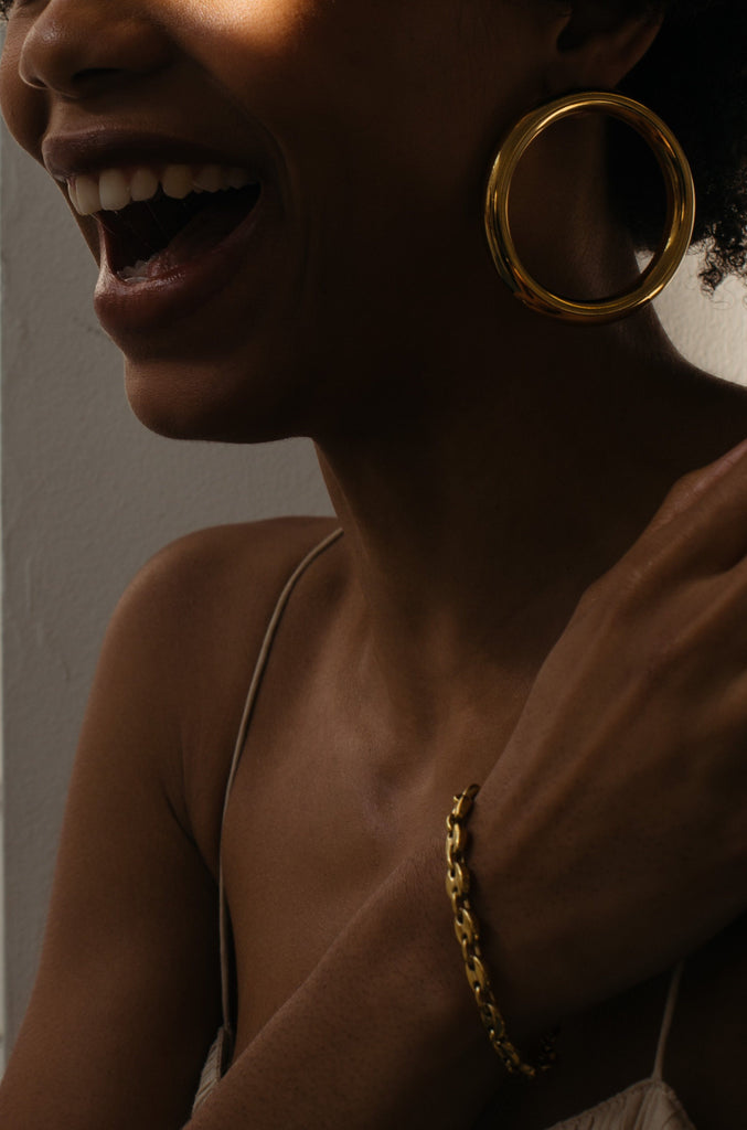 Model wearing Circle Hollow Hoops Earrings and Onia Bracelet  bagatiba