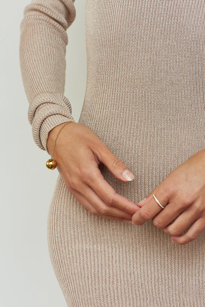 Model wearing Diamond Ring and Gold Sphere Bracelet  Bagatiba