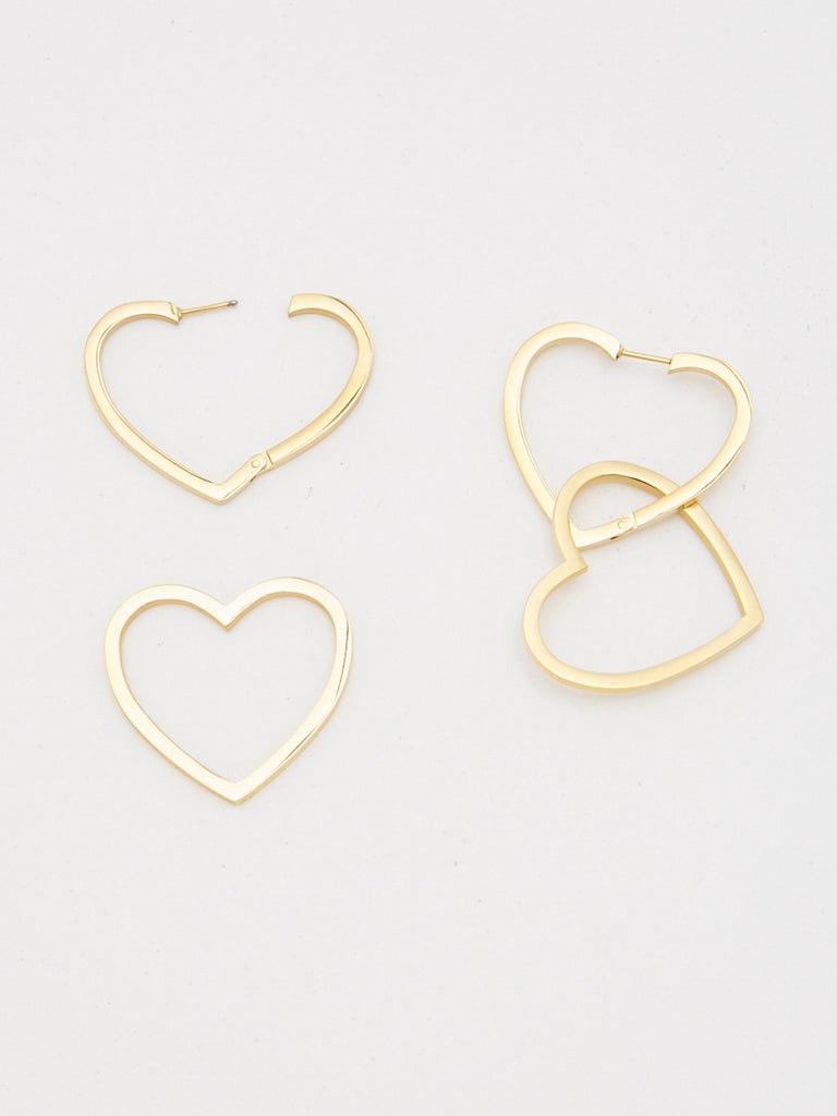 Cropped flat lay detail shot of Double Heart Hoops Earrings bagatiba