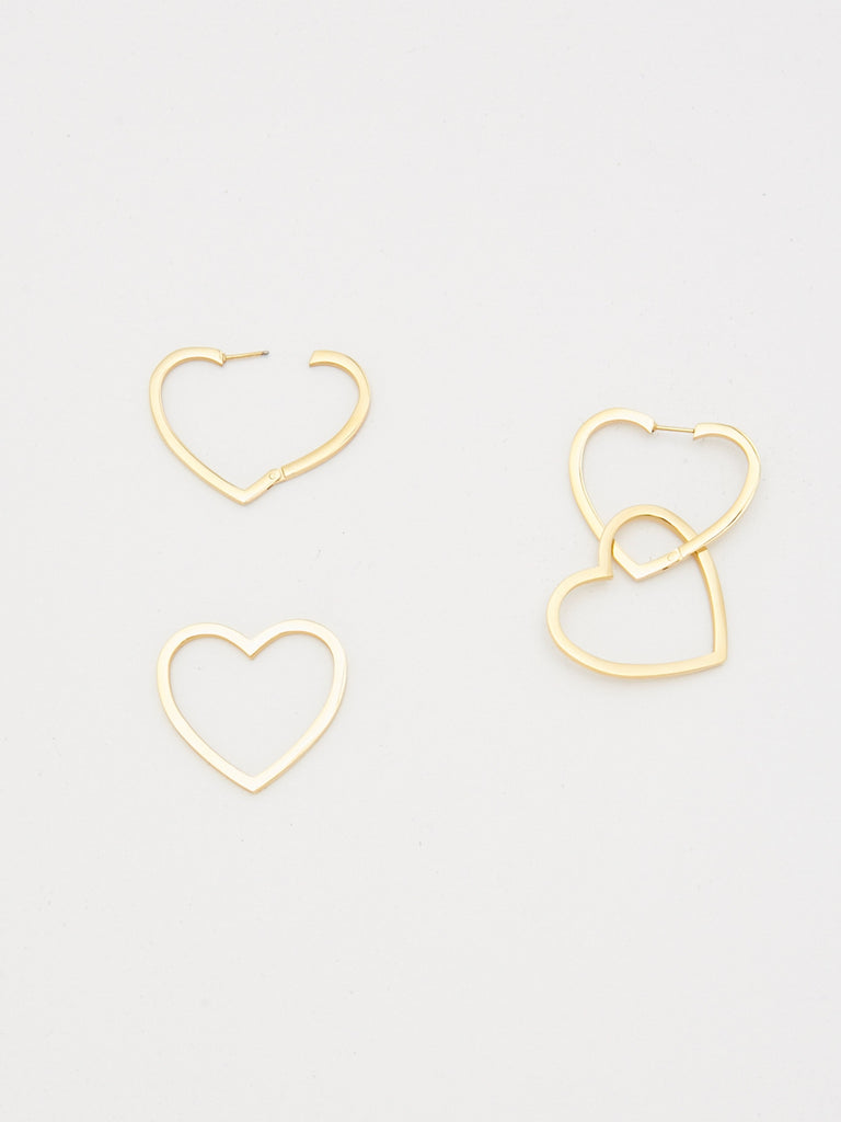 Detail flat lay photo of Double Heart Hoops Earrings bagatiba