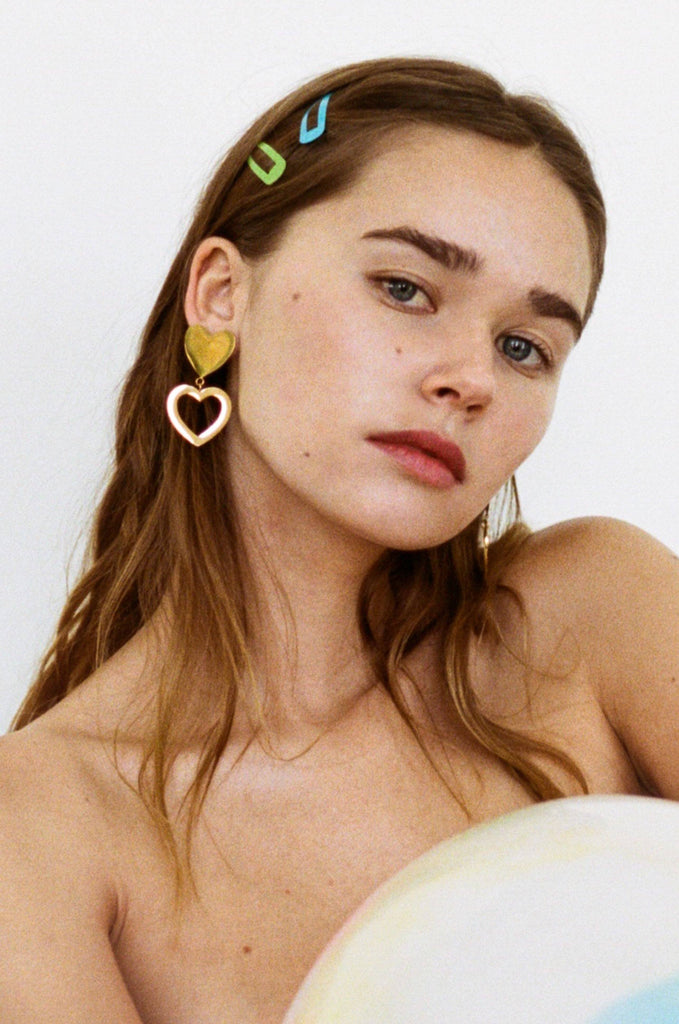 Model wearing the Double Heart Stud Earrings Earrings bagatiba