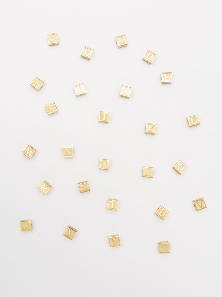 Full view flat lay of multiple Letter Blocks Bagatiba