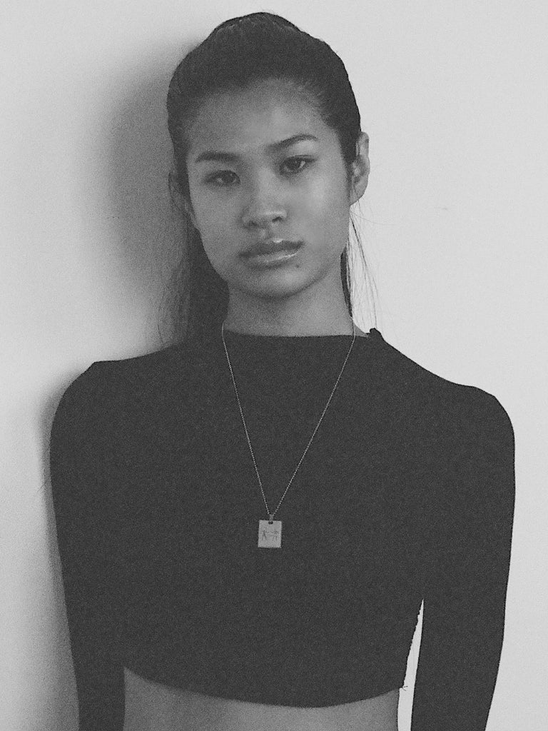Black and White image of model in Gemini Charm charm Bagatiba