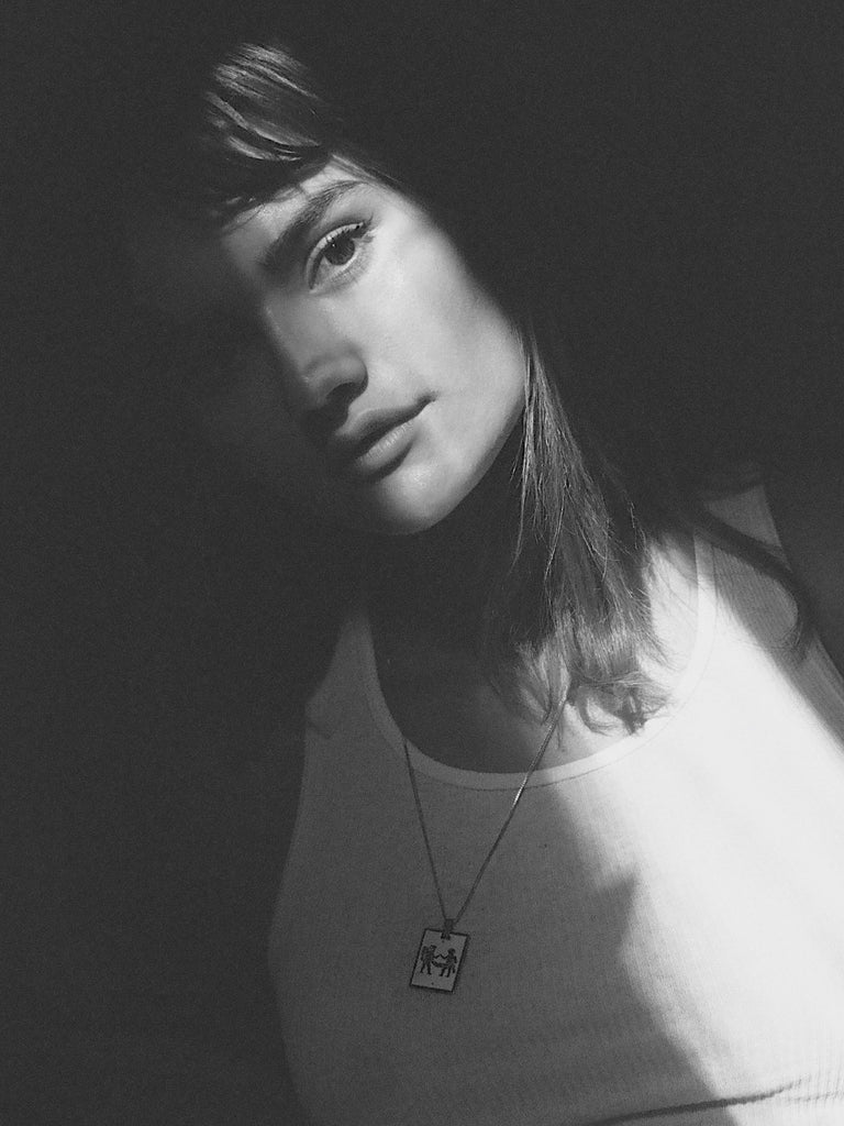 Black and White photo of model in Gemini Charm charm Bagatiba
