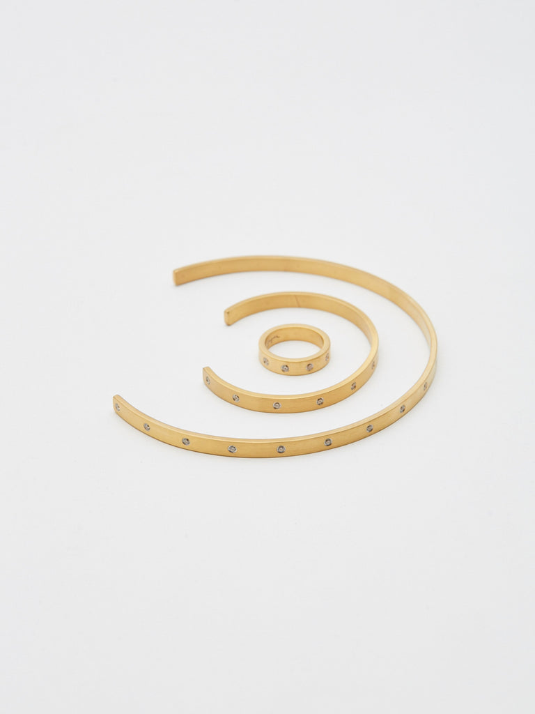 Flat lay view of Gemma Diamond collection including the  Cuff Bracelet bagatiba