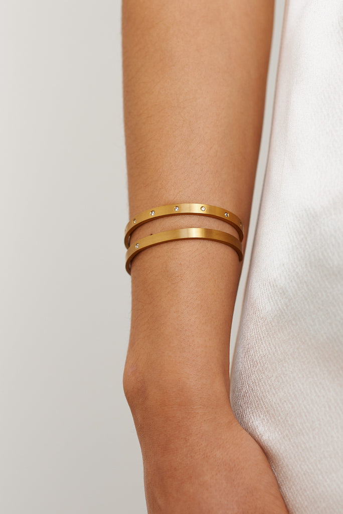 Close up view of model's wrist with Gemma Diamond Cuff Bracelet bagatiba