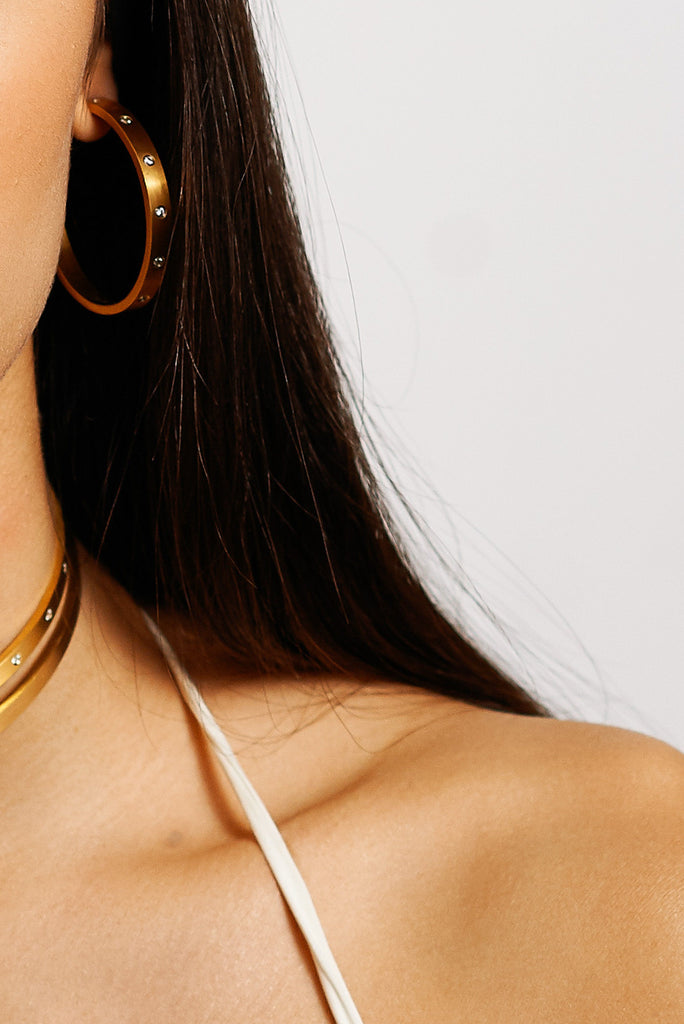 Close view of model's ear with Gemma Diamond Hoops Earrings bagatiba