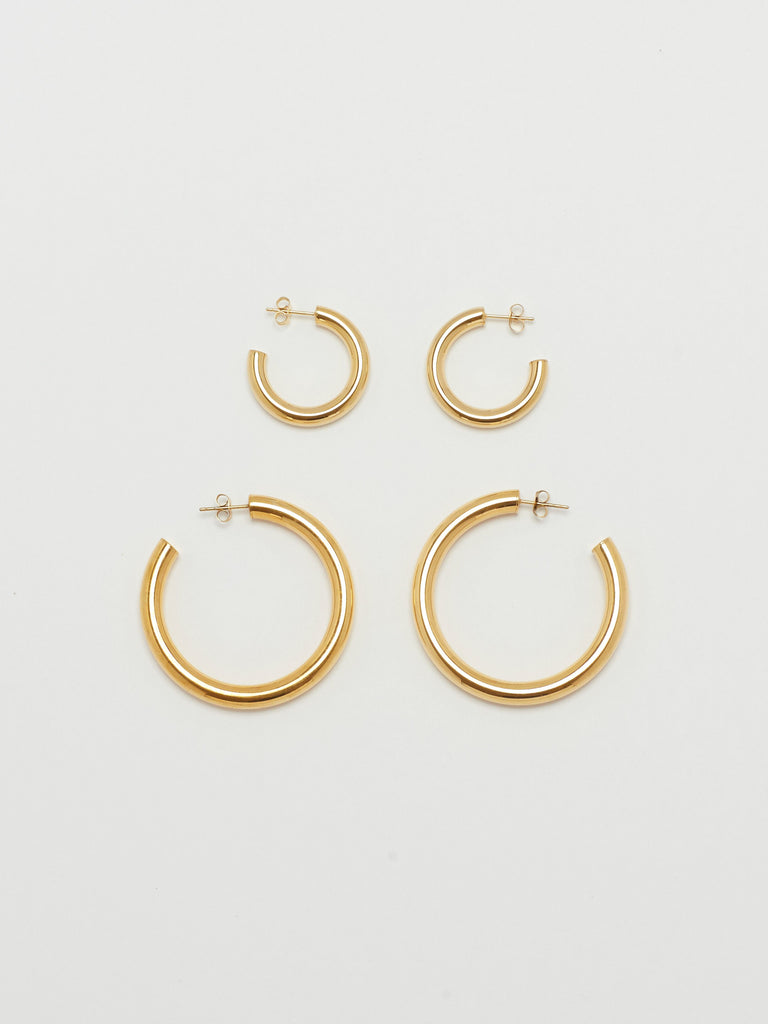 Full view flat lay of Gold Hollow Hoops & Mini Gold Hollow Hoops Earrings Bagatiba