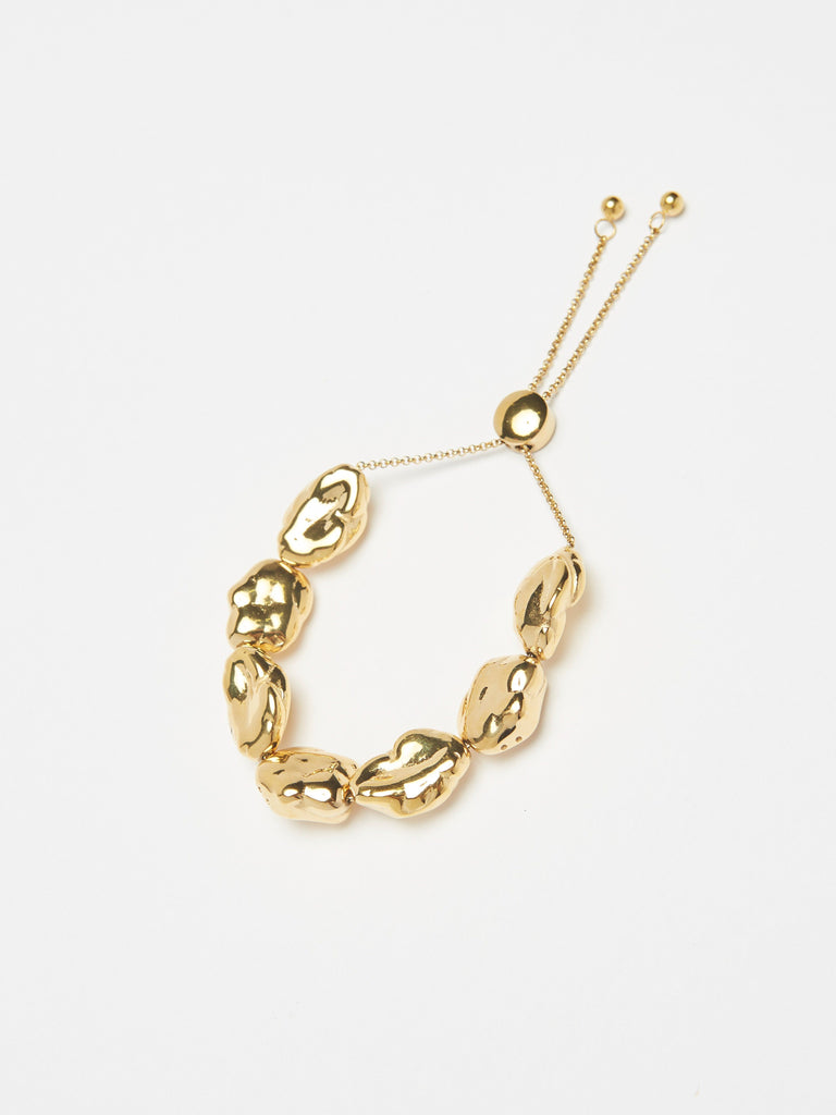 flat lay of Gold Pearl Bracelet Bracelet bagatiba