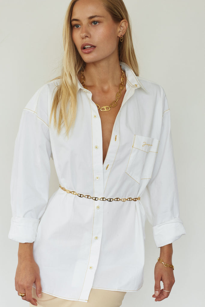 Full view of model wearing the Gold Tab Crossbody Belt Body bagatiba