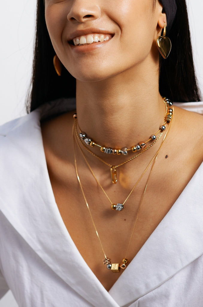 Model wearing Heart Locket Drop Earrings Earrings bagatiba