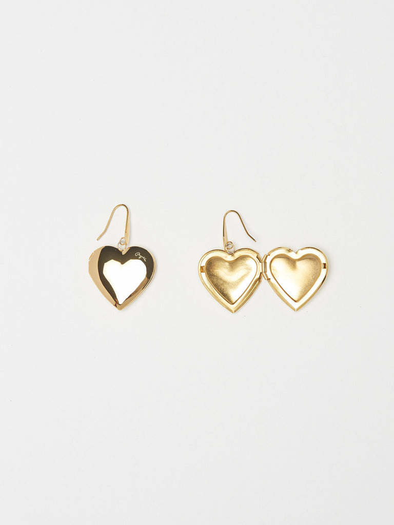 Top view flat lay with open Heart Locket Drop Earrings Earrings bagatiba