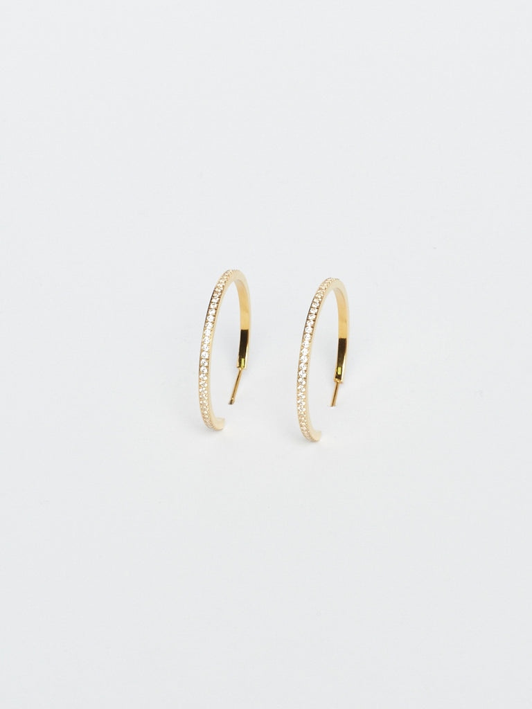 Angled flat lay view of Large Diamond Hoops Earrings Bagatiba