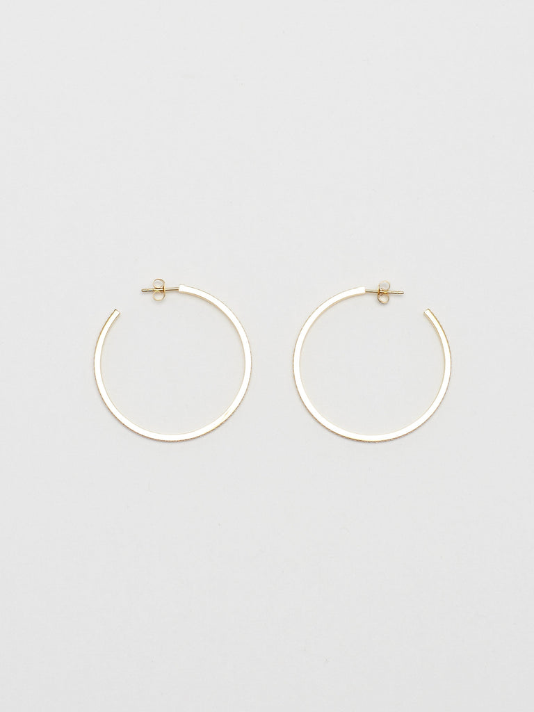 Flat lay of Large Diamond Hoops Earrings Bagatiba