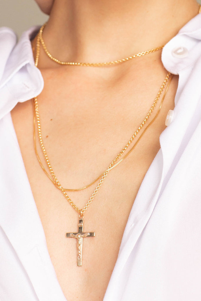 Detail view on model of Long Roller Cross Necklace Necklace Bagatiba