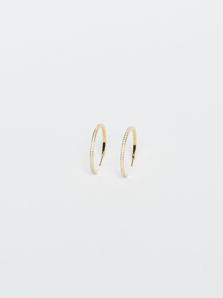 Angled flat lay view of Medium Diamond Hoops Earrings Bagatiba