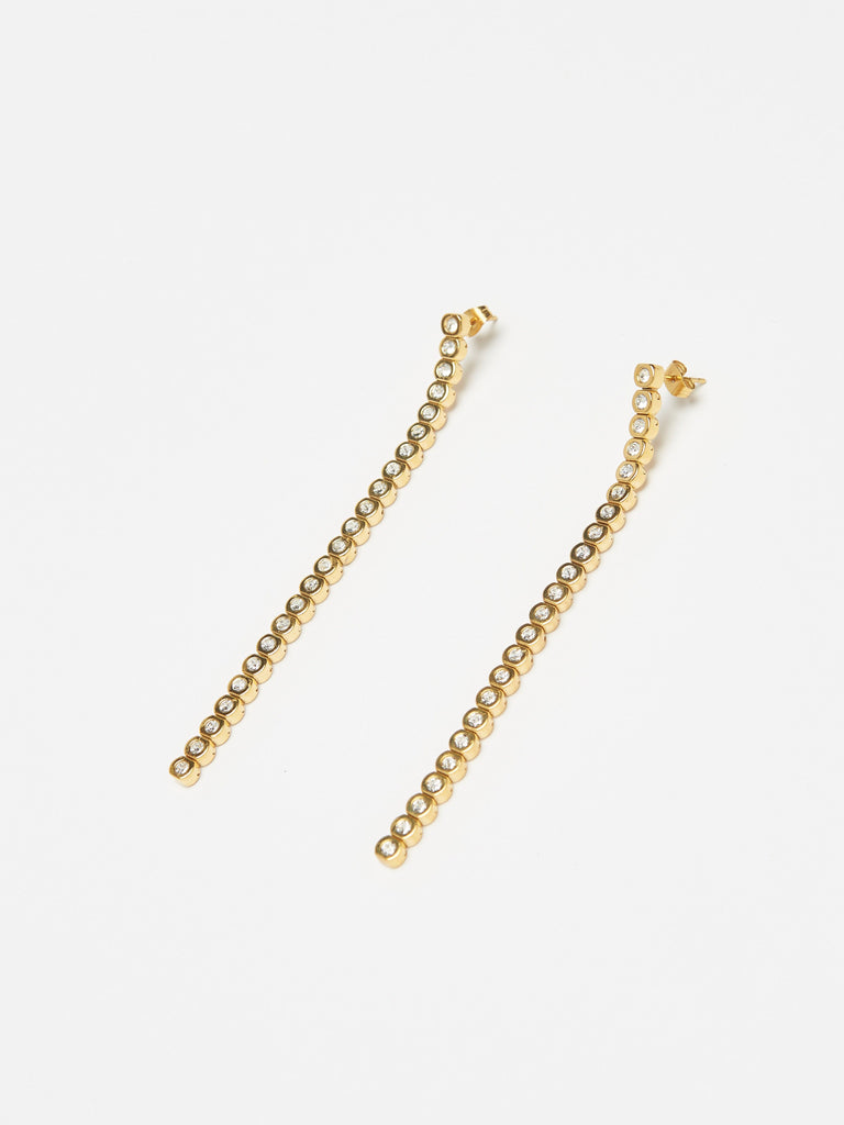 Angled flat lay view of Mika Diamond Line Earrings Earrings bagatiba