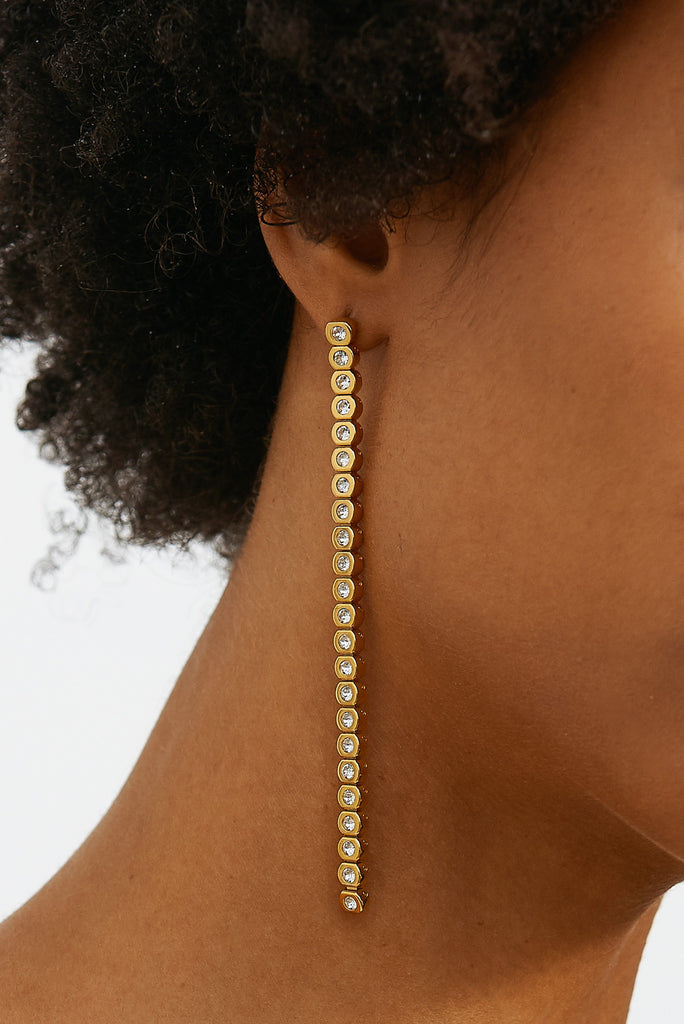 Cropped view on model of Mika Diamond Line Earrings Earrings bagatiba