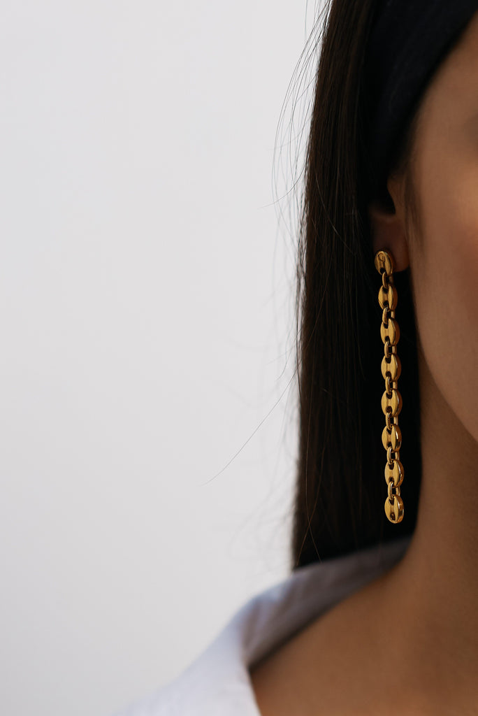 Close view on model of Onia Drop Earrings Earrings Bagatiba
