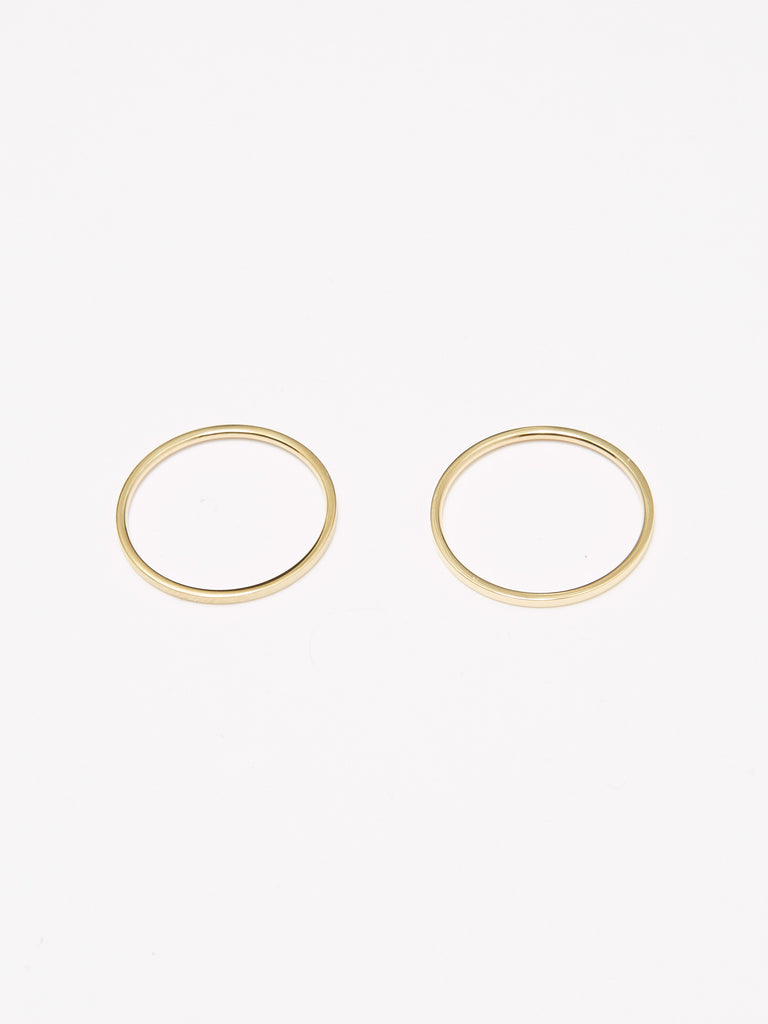 Flat lay image of two Polished Gold Ring Ring Bagatiba