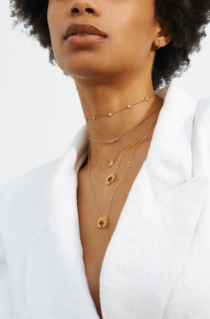 Model wearing the Princess Choker paired with other styles by Bagatiba