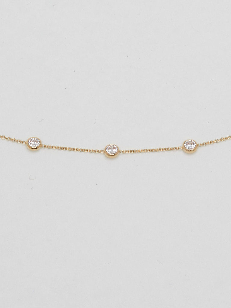 Detailed flat lay view of Princess Drop Necklace by Bagatiba