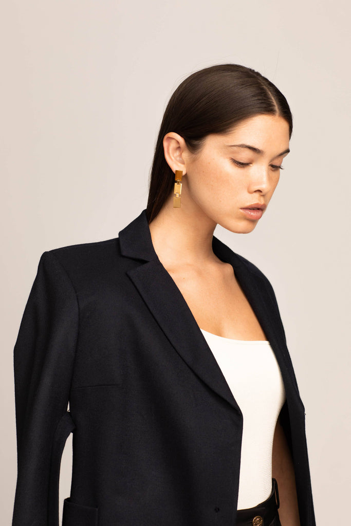 Model wearing the Rectangle Dangle Earrings Earrings Bagatiba