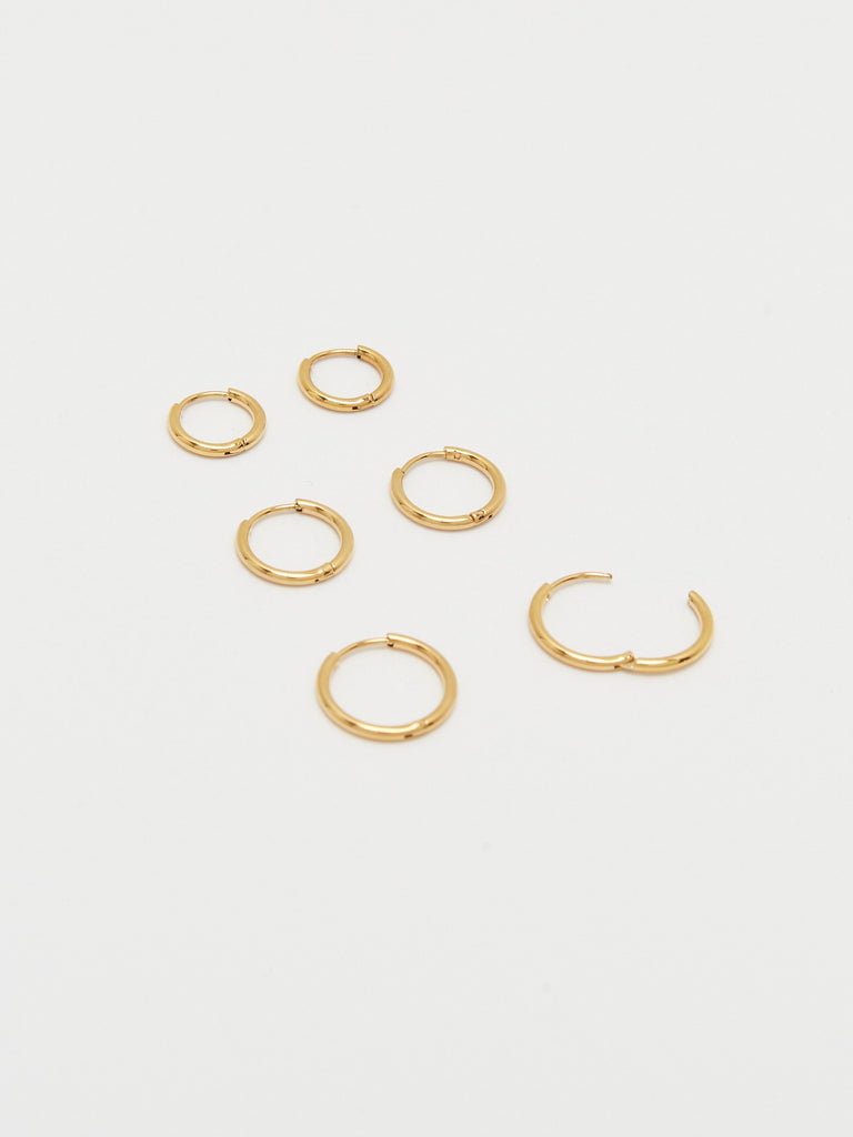 Detail view flat lay Set of Gold Eco Huggies Earrings Bagatiba