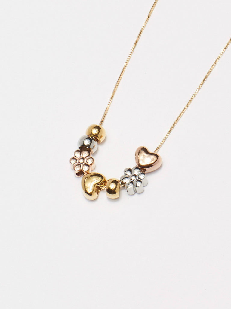 Flat lay detailed view of Silver Bead Set on Square Chain with Gold & Rose Gold Bead Sets mixed by  Bagatiba