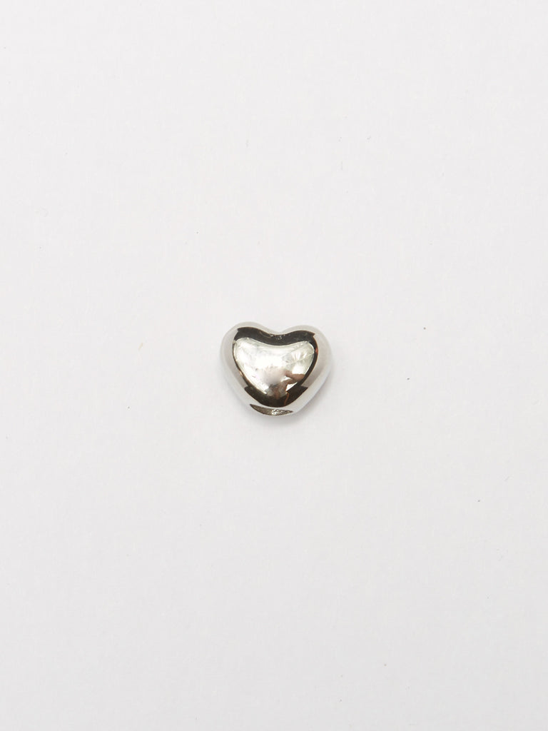 Detail view of heart bead from the Silver Bead Set Bagatiba