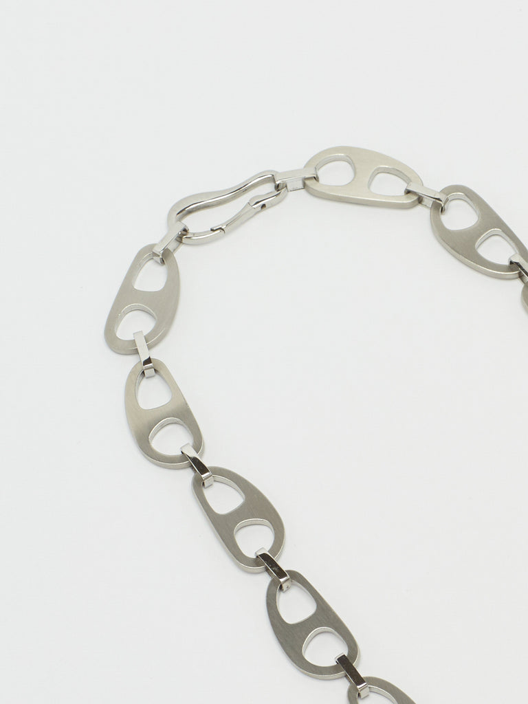 Close view flat lay of Silver Brushed Tab Necklace by bagatiba