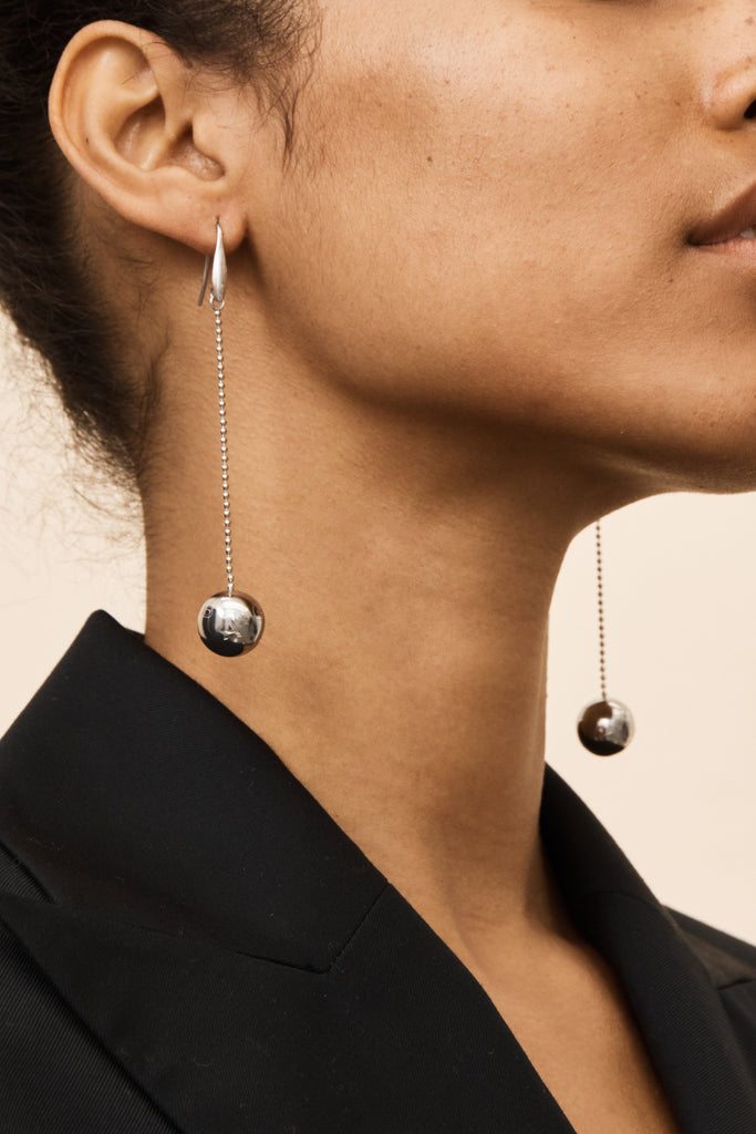 Detailed view on model of Silver Drop Sphere Earrings by bagatiba