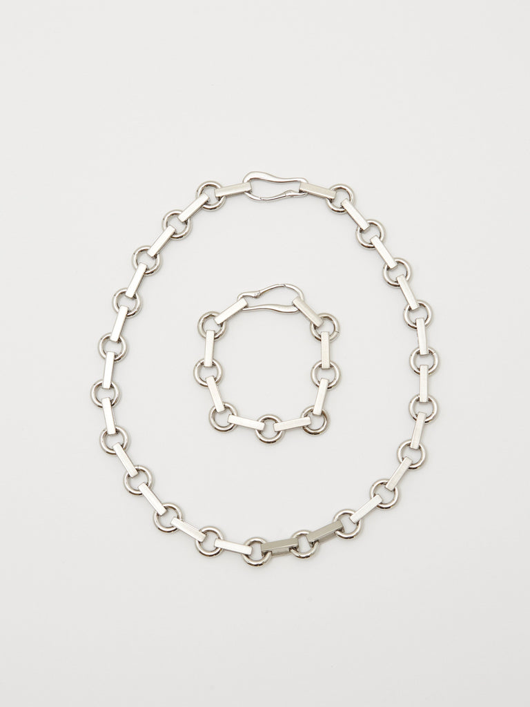 Full view flat lay of the Silver Tilda Bracelet and Necklace bagatiba