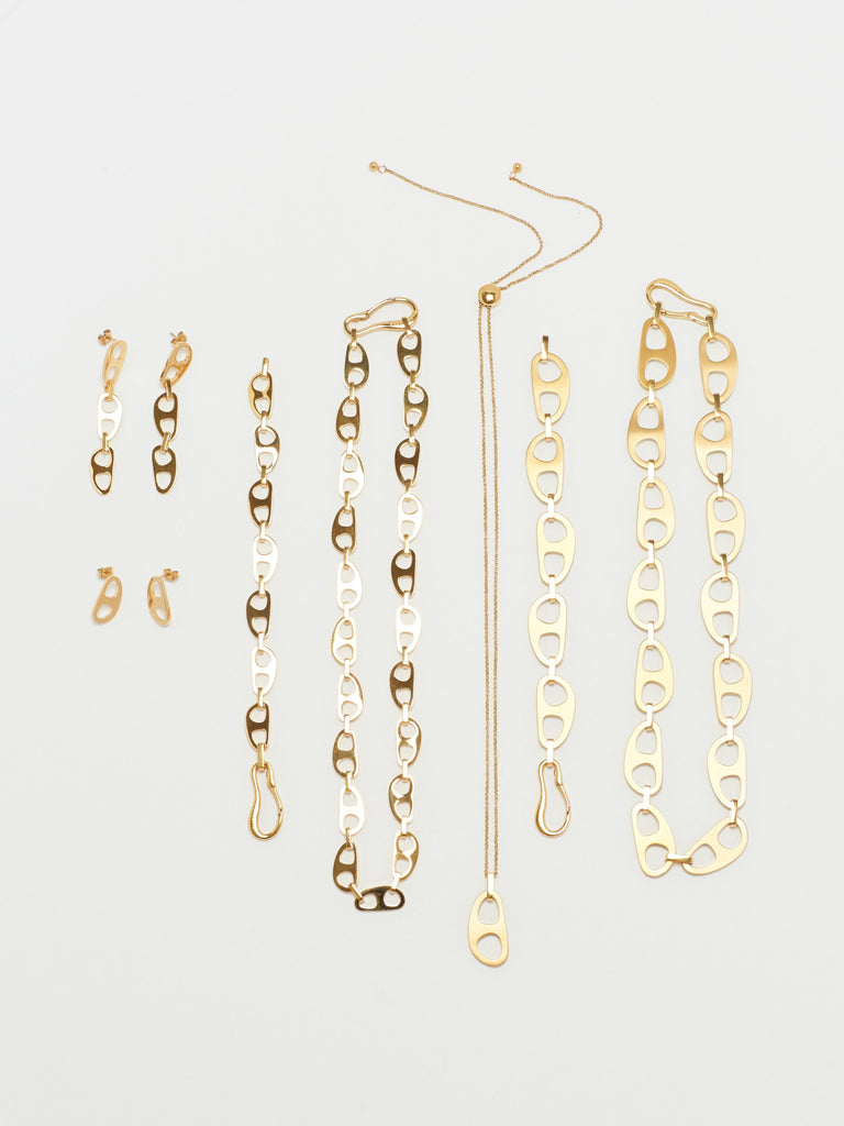 Full view flat lay of Gold Tab collection by bagatiba