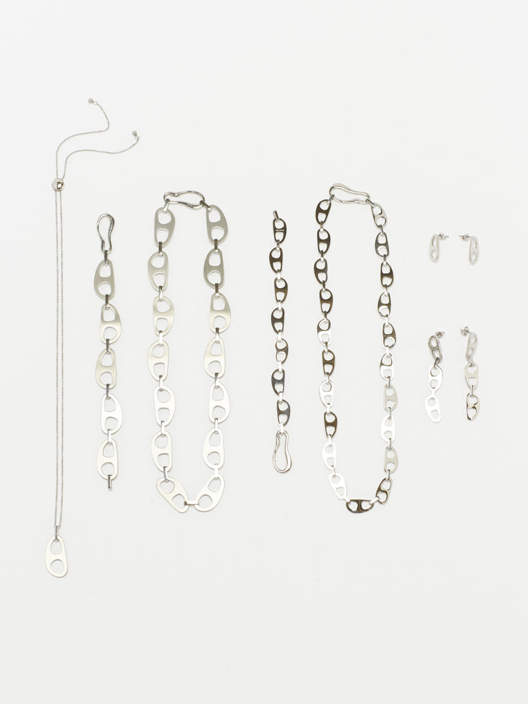 Full view flat lay of the Silver Tab Collection by bagatiba