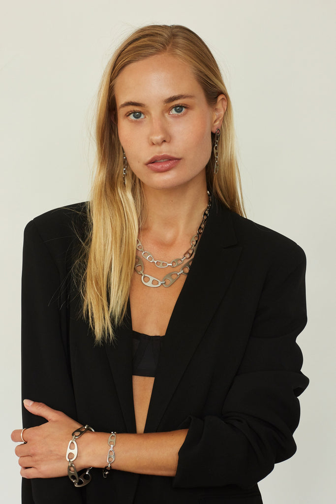 Full view of model wearing the Small Silver Tab Bracelet Necklace bagatiba