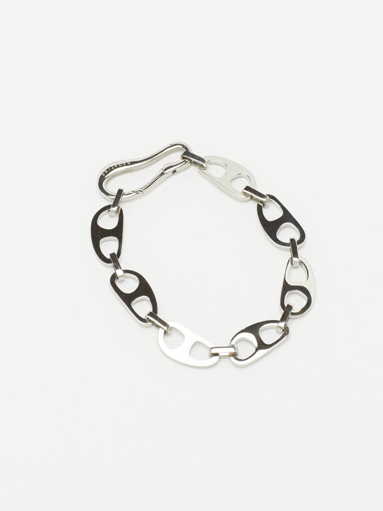 Cropped flat lay of Small Silver Tab Bracelet Necklace bagatiba
