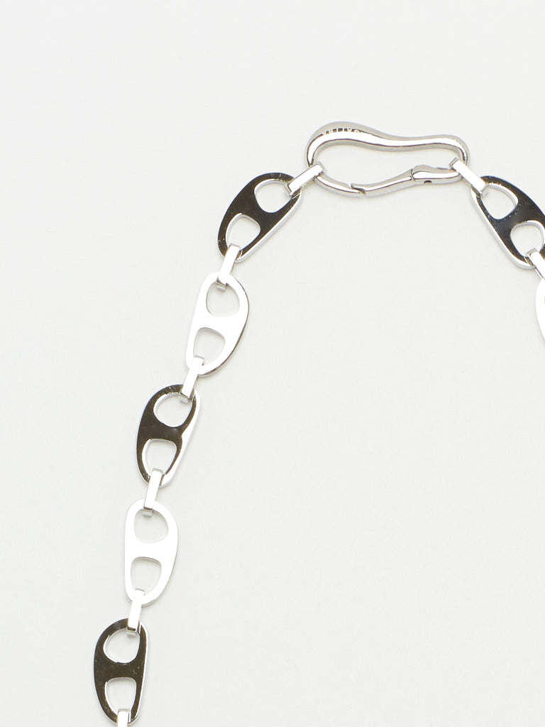 Cropped detail flat lay view of the Small Silver Tab Necklace Necklace bagatiba