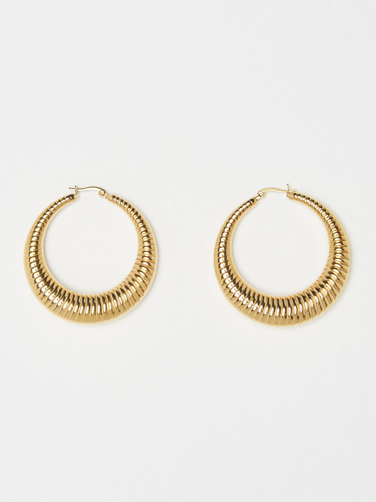 Cropped flat lay view of the Spiral Hoops Earrings bagatiba