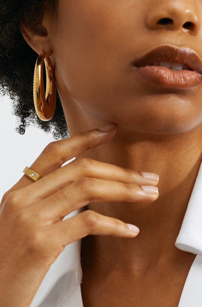 Model profile view in the Spiral Hoops Earrings bagatiba