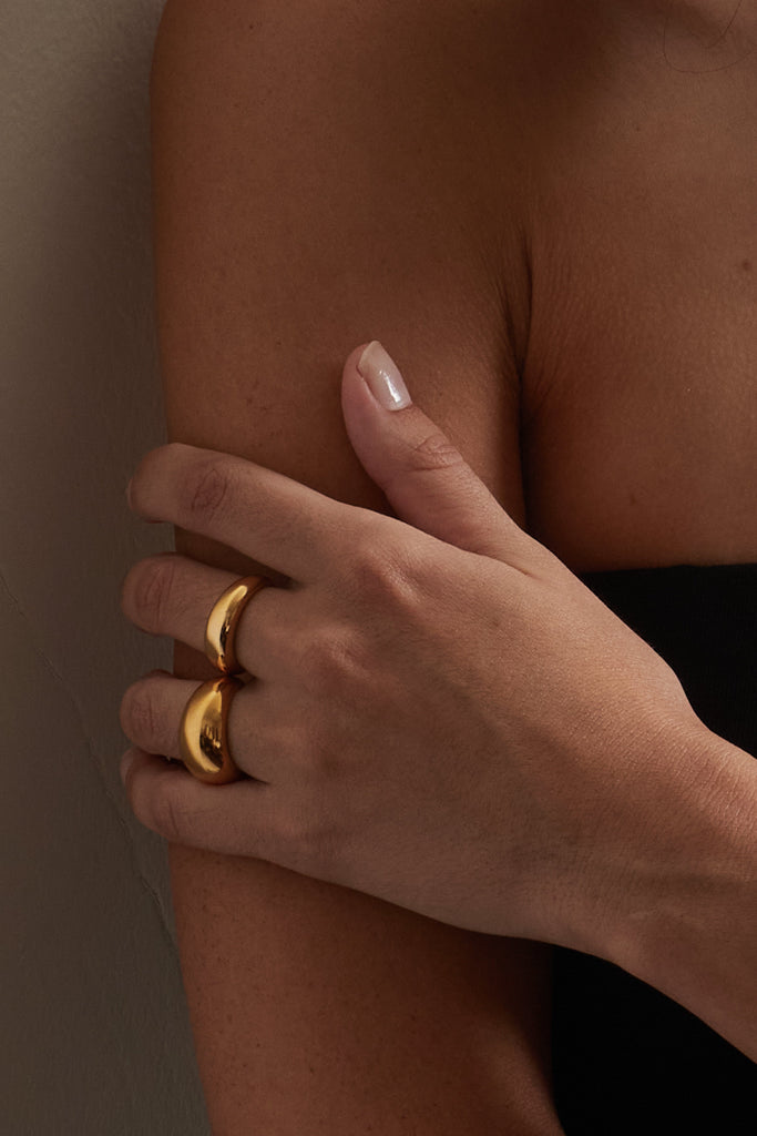 Full view of Thin Gold Orb Ring Ring bagatiba on model