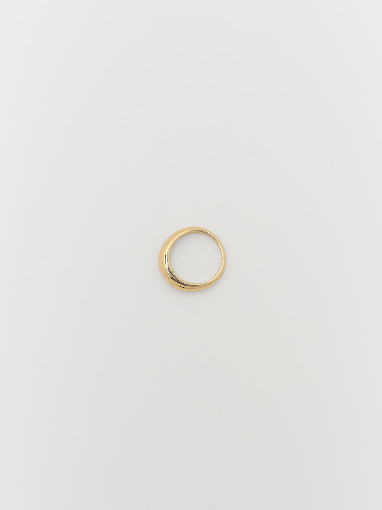 Full view overhead flat lay of Thin Gold Orb Ring Ring bagatiba
