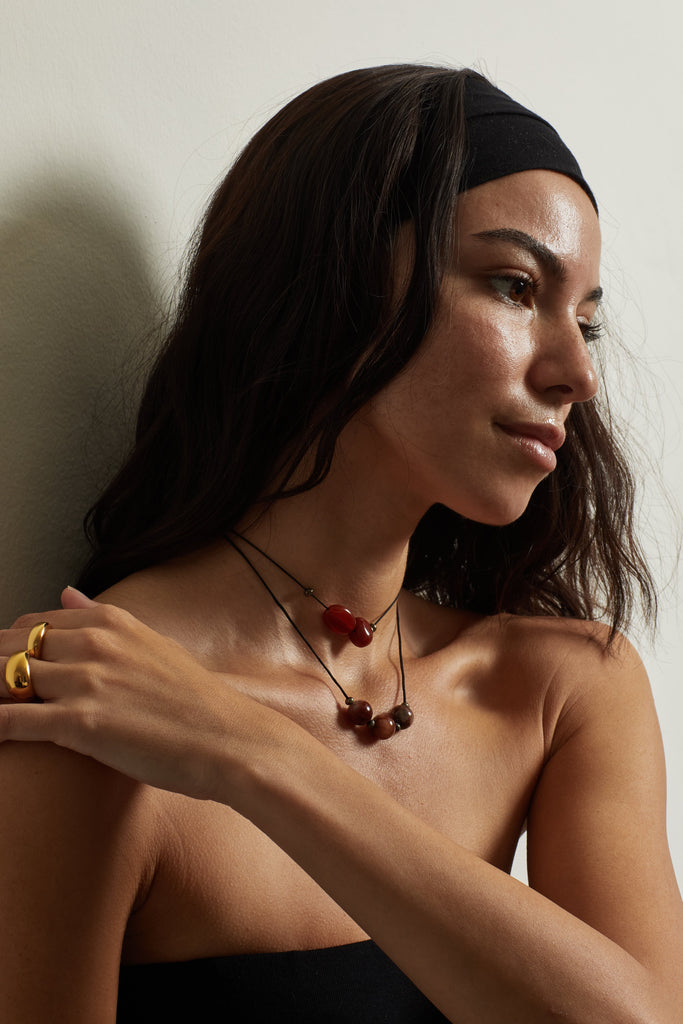 Full view of Thin Gold Orb Ring Ring bagatiba on model hand up