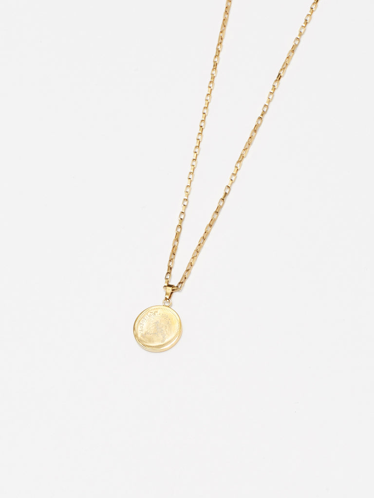 Cropped detail flat lay view of the Tiger Charm Necklace Necklace Bagatiba